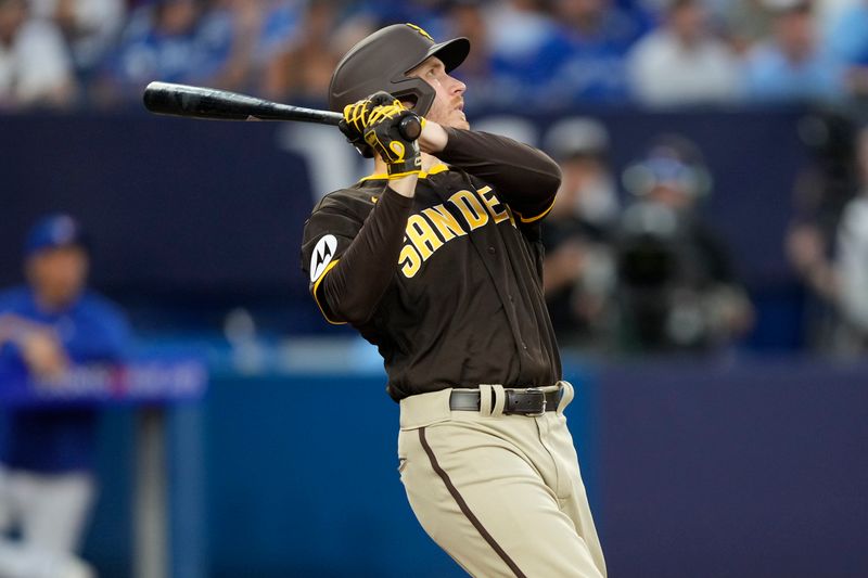 Jul 19, 2023; Toronto, Ontario, CAN; San Diego Padres right fielder Taylor Kohlwey (38) hits a fly ball against the Toronto Blue Jays during the fifth inning at Rogers Centre in his first MLB game. Mandatory Credit: John E. Sokolowski-USA TODAY Sports