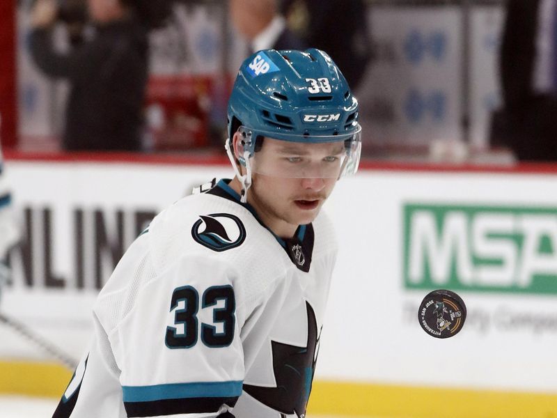 Mar 14, 2024; Pittsburgh, Pennsylvania, USA; San Jose Sharks defenseman Calen Addison (33) juggles a puck to warm up against the Pittsburgh Penguins at PPG Paints Arena. Mandatory Credit: Charles LeClaire-USA TODAY Sports