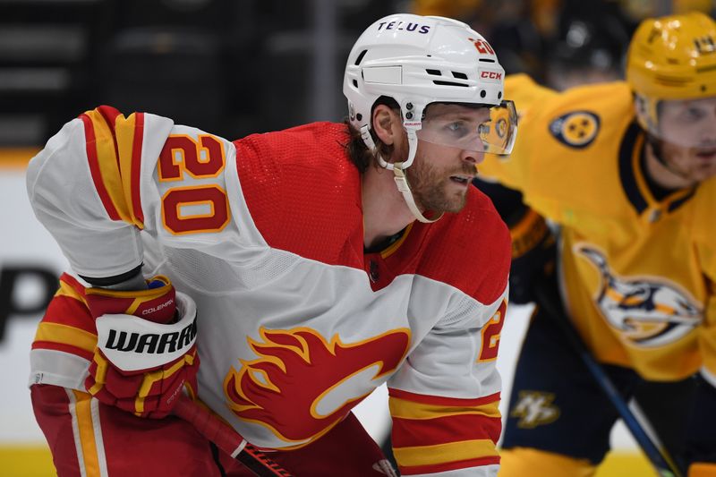 Jan 4, 2024; Nashville, Tennessee, USA; Calgary Flames center Blake Coleman (20) waits for a face off during the second period against the Nashville Predators at Bridgestone Arena. Mandatory Credit: Christopher Hanewinckel-USA TODAY Sports