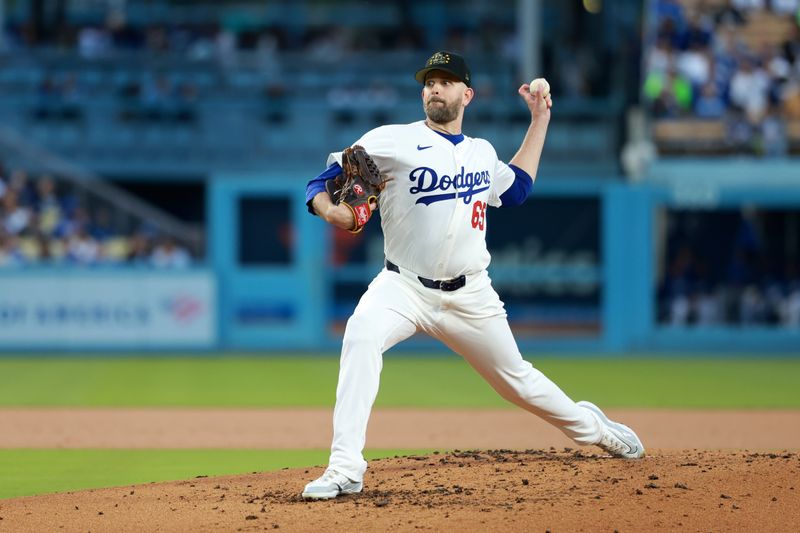 May 17, 2024; Los Angeles, California, USA;  Los Angeles Dodgers starting pitcher James Paxton (65) pitches during the second inning against the Cincinnati Reds at Dodger Stadium. Mandatory Credit: Kiyoshi Mio-USA TODAY Sports