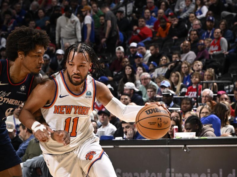 PHILADELPHIA, PA - FEBRUARY 22: Jalen Brunson #11 of the New York Knicks dribbles the ball during the game against the Philadelphia 76ers on February 22, 2024 at the Wells Fargo Center in Philadelphia, Pennsylvania NOTE TO USER: User expressly acknowledges and agrees that, by downloading and/or using this Photograph, user is consenting to the terms and conditions of the Getty Images License Agreement. Mandatory Copyright Notice: Copyright 2024 NBAE (Photo by David Dow/NBAE via Getty Images)