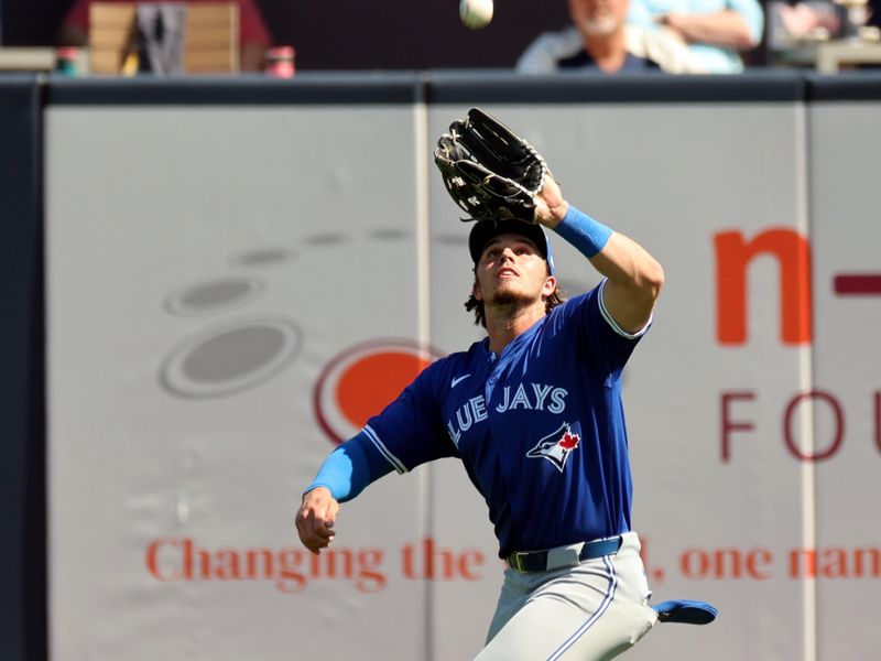 Feb 25, 2024; Tampa, Florida, USA; Toronto Blue Jays outfielder Addison Barger (47) makes a catch against the New York Yankees at George M. Steinbrenner Field. Mandatory Credit: Kim Klement Neitzel-USA TODAY Sports