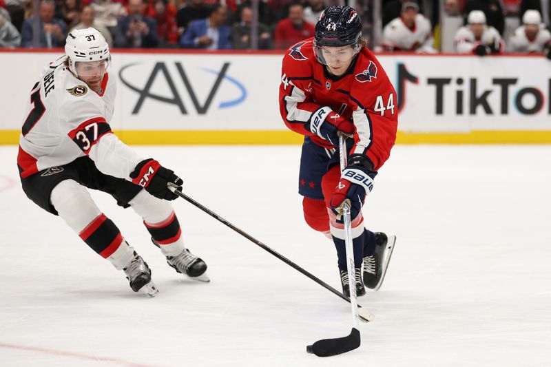 Mar 18, 2026; Washington, District of Columbia, USA; Washington Capitals defenseman Cole Hutson (44) controls the puck past Ottawa Senators left wing Warren Foegele (37) during the first period at Capital One Arena. Mandatory Credit: Daniel Kucin Jr.-Imagn Images