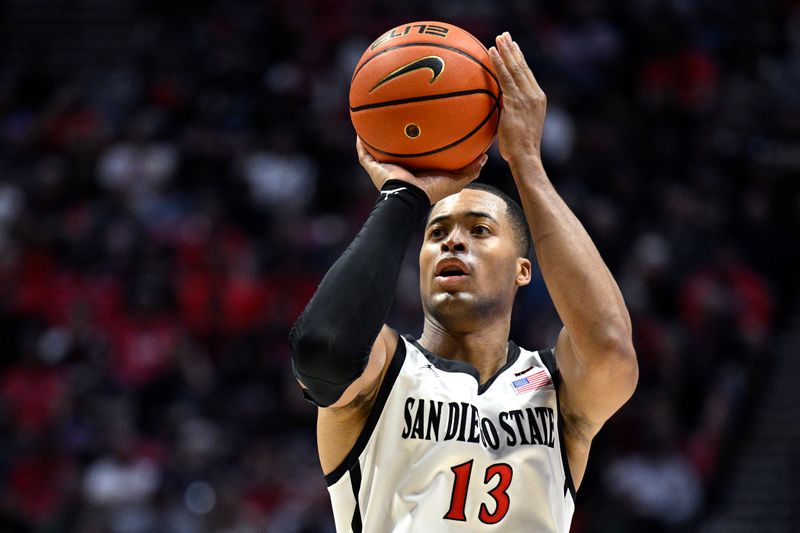 Jan 6, 2024; San Diego, California, USA; San Diego State Aztecs forward Jaedon LeDee (13) shoots the ball during the first half against the UNLV Rebels at Viejas Arena. Mandatory Credit: Orlando Ramirez-USA TODAY Sports