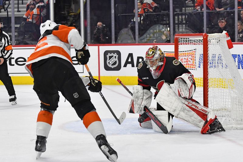 Mar 2, 2024; Philadelphia, Pennsylvania, USA;  Ottawa Senators goaltender Mads Sogaard (40) makes a save against Philadelphia Flyers left wing Joel Farabee (86) during the first period at Wells Fargo Center. Mandatory Credit: Eric Hartline-USA TODAY Sports