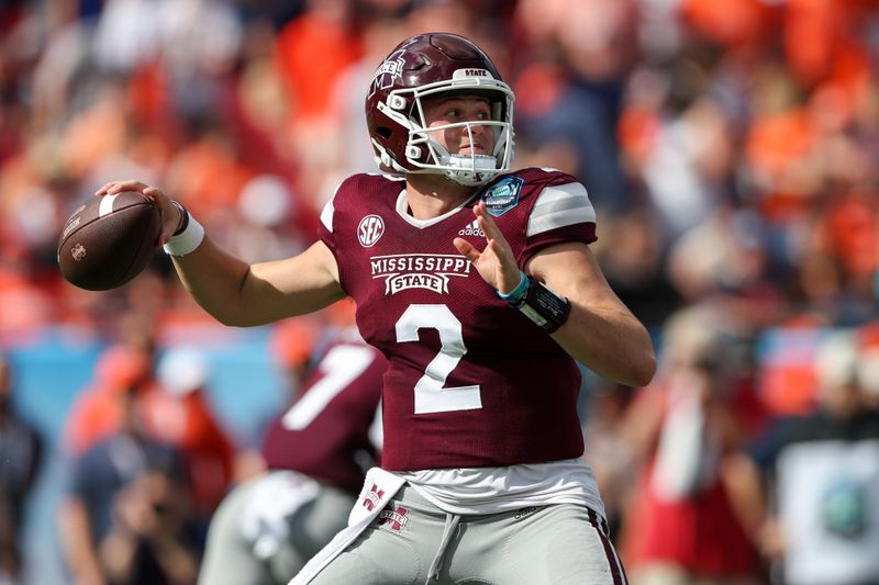 Jan 2, 2023; Tampa, FL, USA; Mississippi State Bulldogs quarterback Will Rogers (2) drops back to pass against the Illinois Fighting Illini in the first quarter during the 2023 ReliaQuest Bowl at Raymond James Stadium. Mandatory Credit: Nathan Ray Seebeck-USA TODAY Sports