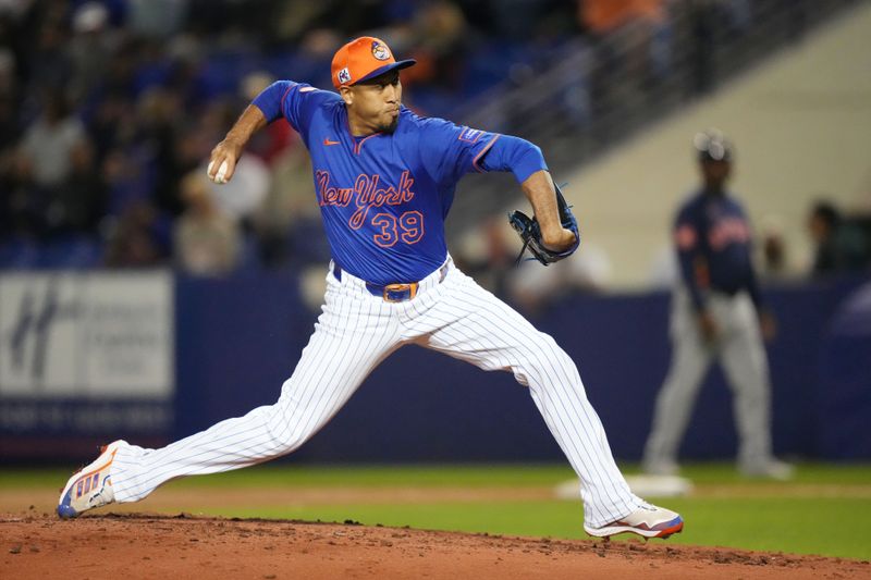 Mar 6, 2025; Port St. Lucie, Florida, USA;  New York Mets pitcher Edwin Díaz (39) pitches in the 4th inning against the Houston Astros at Clover Park. Mandatory Credit: Jim Rassol-Imagn Images