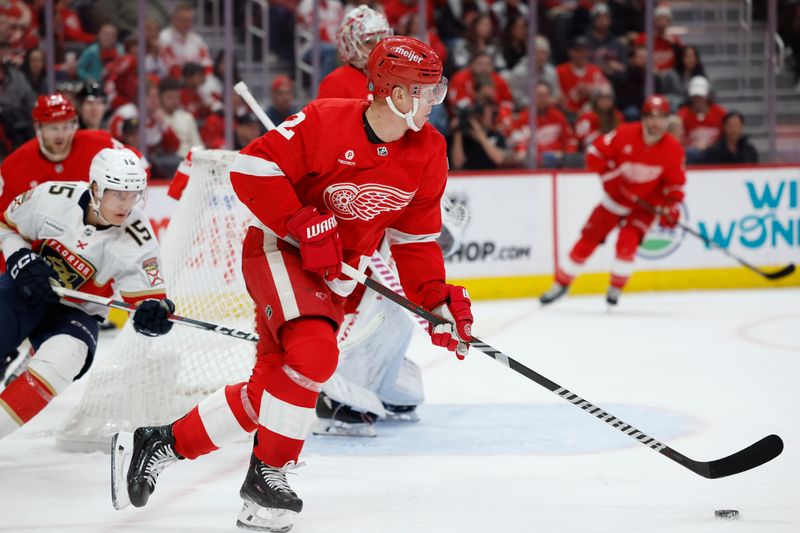 Mar 2, 2024; Detroit, Michigan, USA; Detroit Red Wings defenseman Olli Maatta (2) skates with the puck in the third period against the Florida Panthers at Little Caesars Arena. Mandatory Credit: Rick Osentoski-USA TODAY Sports