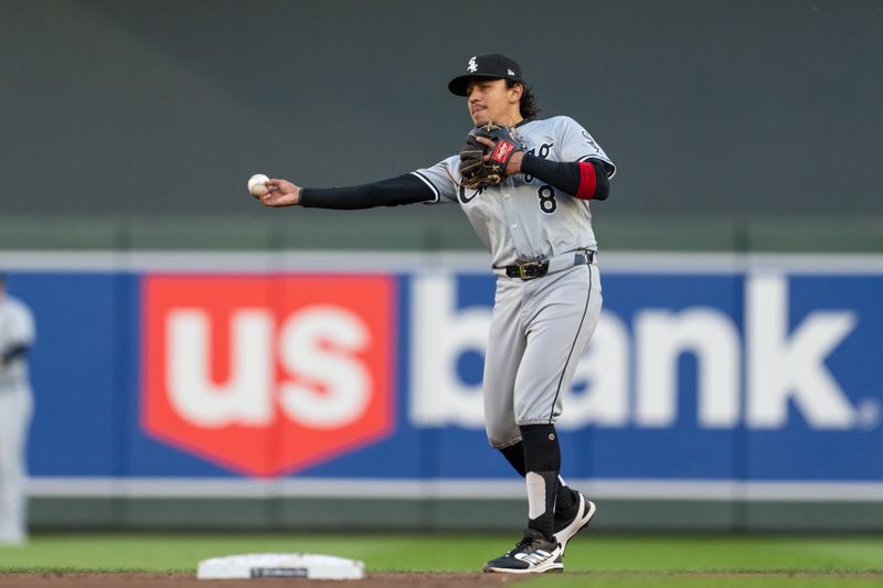 Apr 23, 2024; Minneapolis, Minnesota, USA; Chicago White Sox second baseman Nicky Lopez (8) throws after pitcher Erick Fedde (not pictured) strikes out Minnesota Twins outfielder Alex Kirilloff (not pictured) in the third inning at Target Field. Mandatory Credit: Matt Blewett-USA TODAY Sports