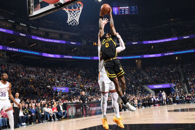 SAN FRANCISCO, CA - FEBRUARY 10: Gary Payton II #0 of the Golden State Warriors drives to the basket during the game against the Phoenix Suns on February 10, 2024 at Chase Center in San Francisco, California. NOTE TO USER: User expressly acknowledges and agrees that, by downloading and or using this photograph, user is consenting to the terms and conditions of Getty Images License Agreement. Mandatory Copyright Notice: Copyright 2024 NBAE (Photo by Noah Graham/NBAE via Getty Images)