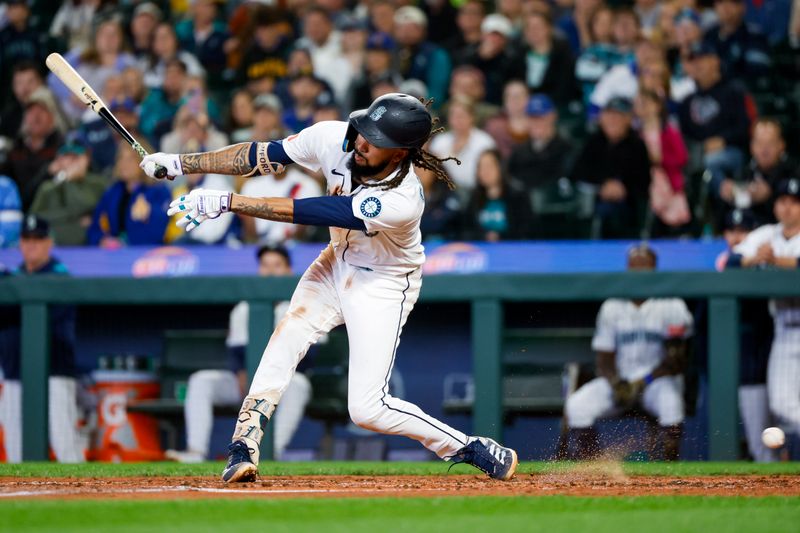 May 31, 2025; Seattle, Washington, USA; Seattle Mariners shortstop J.P. Crawford (3) strikes out against the Minnesota Twins during the third inning at T-Mobile Park. Mandatory Credit: Joe Nicholson-Imagn Images