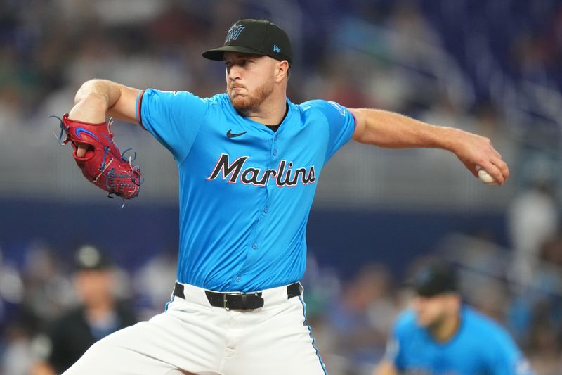 Jun 9, 2024; Miami, Florida, USA; Miami Marlins starting pitcher Trevor Rogers (28) pitches against the Cleveland Guardians in the first inning at loanDepot Park. Mandatory Credit: Jim Rassol-USA TODAY Sports