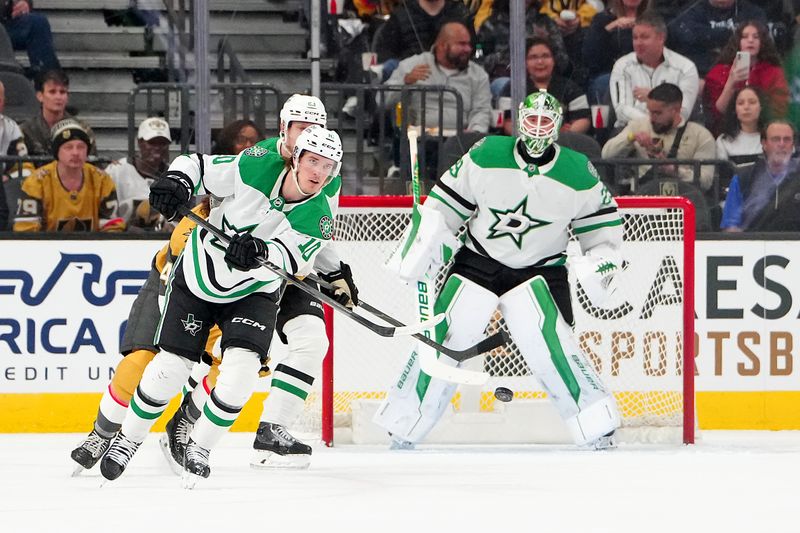 Jan 29, 2026; Las Vegas, Nevada, USA; Dallas Stars center Oskar Bäck (10) clears the puck during a Vegas Golden Knights power play during the first period at T-Mobile Arena. Mandatory Credit: Stephen R. Sylvanie-Imagn Images
