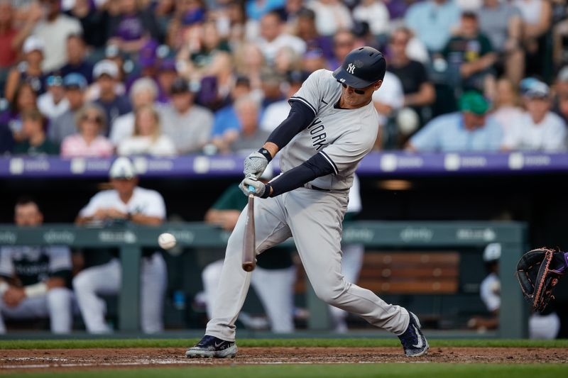 Jul 15, 2023; Denver, Colorado, USA; New York Yankees first baseman Anthony Rizzo (48) hits a single in the fourth inning against the Colorado Rockies at Coors Field. Mandatory Credit: Isaiah J. Downing-USA TODAY Sports