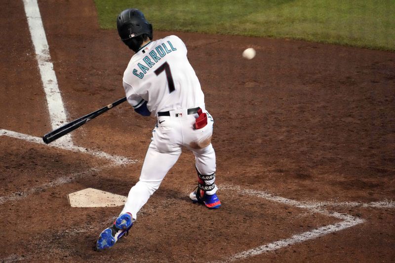 Jun 18, 2023; Phoenix, Arizona, USA; Arizona Diamondbacks center fielder Corbin Carroll (7) bats against the Cleveland Guardians during the fifth inning at Chase Field. Mandatory Credit: Joe Camporeale-USA TODAY Sports