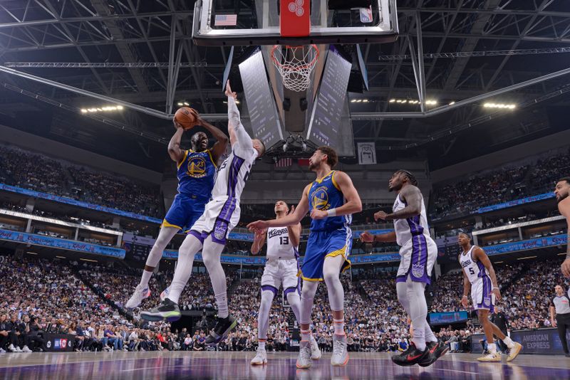 SACRAMENTO, CA - APRIL 16: Draymond Green #23 of the Golden State Warriors drives to the basket during the game against the Sacramento Kings during the 2024 Play-In Tournament on April 16, 2024 at Golden 1 Center in Sacramento, California. NOTE TO USER: User expressly acknowledges and agrees that, by downloading and or using this Photograph, user is consenting to the terms and conditions of the Getty Images License Agreement. Mandatory Copyright Notice: Copyright 2024 NBAE (Photo by Rocky Widner/NBAE via Getty Images)