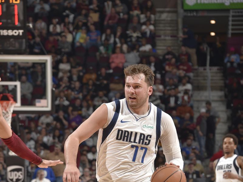 CLEVELAND, OH - FEBRUARY 27: Luka Doncic #77 of the Dallas Mavericks dribbles the ball during the game against the Cleveland Cavaliers on February 27, 2024 at Rocket Mortgage FieldHouse in Cleveland, Ohio. NOTE TO USER: User expressly acknowledges and agrees that, by downloading and/or using this Photograph, user is consenting to the terms and conditions of the Getty Images License Agreement. Mandatory Copyright Notice: Copyright 2024 NBAE (Photo by David Liam Kyle/NBAE via Getty Images)