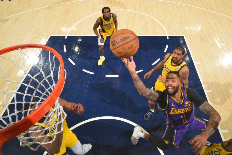 INDIANAPOLIS, IN - MARCH 29: D'Angelo Russell #1 of the Los Angeles Lakers drives to the basket during the game against the Indiana Pacers on March 24, 2024 at Gainbridge Fieldhouse in Indianapolis, Indiana. NOTE TO USER: User expressly acknowledges and agrees that, by downloading and or using this Photograph, user is consenting to the terms and conditions of the Getty Images License Agreement. Mandatory Copyright Notice: Copyright 2024 NBAE (Photo by Jesse D. Garrabrant /NBAE via Getty Images)