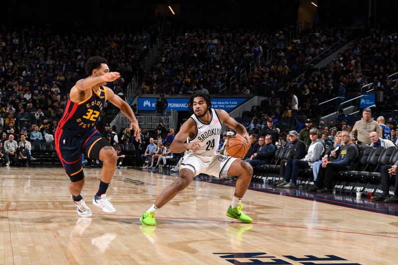 SAN FRANCISCO, CA - NOVEMBER 25: Cam Thomas #24 of the Brooklyn Nets handles the ball during the game against the Golden State Warriors on November 25, 2024 at Chase Center in San Francisco, California. NOTE TO USER: User expressly acknowledges and agrees that, by downloading and or using this photograph, user is consenting to the terms and conditions of Getty Images License Agreement. Mandatory Copyright Notice: Copyright 2024 NBAE (Photo by Noah Graham/NBAE via Getty Images)