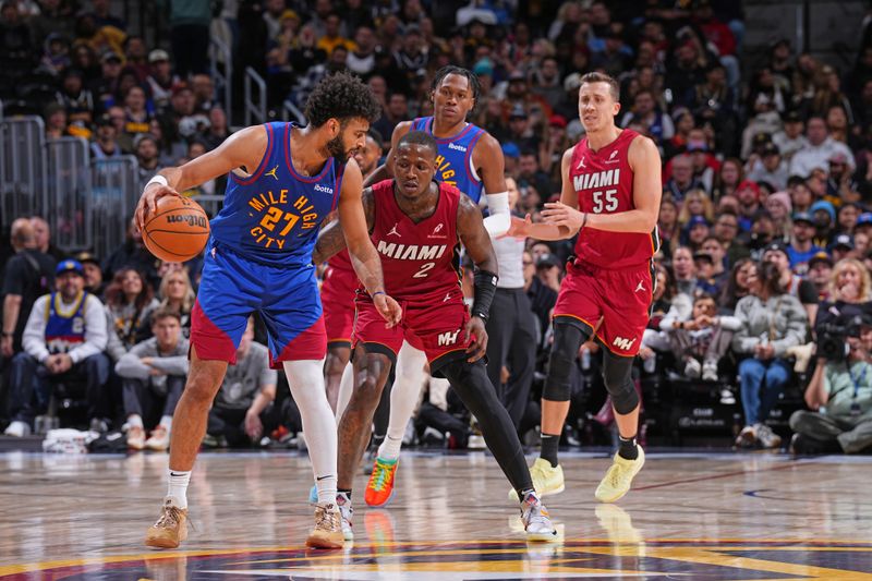 DENVER, CO - NOVEMBER 8: Jamal Murray #27 of the Denver Nuggets dribbles the ball during the game against the Miami Heat on November 8, 2024 at Ball Arena in Denver, Colorado. NOTE TO USER: User expressly acknowledges and agrees that, by downloading and/or using this Photograph, user is consenting to the terms and conditions of the Getty Images License Agreement. Mandatory Copyright Notice: Copyright 2024 NBAE (Photo by Garrett Ellwood/NBAE via Getty Images)