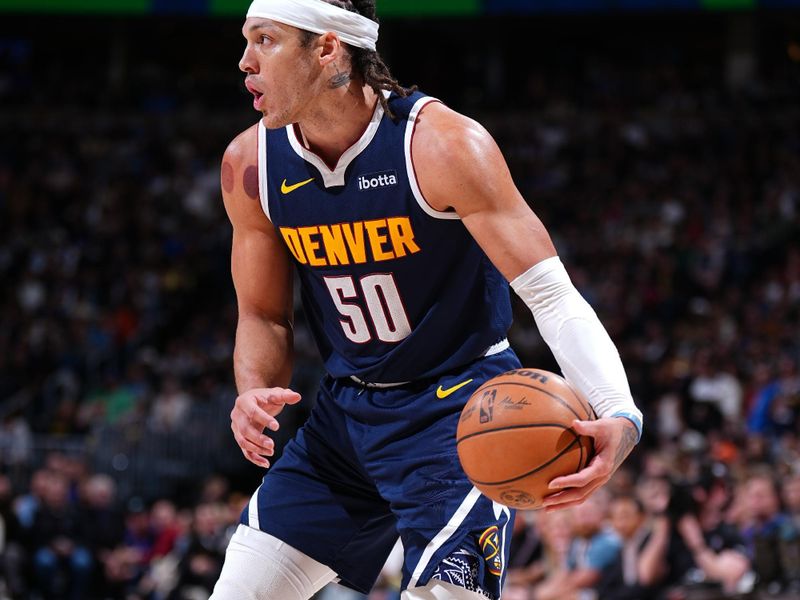 DENVER, CO - APRIL 10: Aaron Gordon #50 of the Denver Nuggets dribbles the ball during the game against the Minnesota Timberwolves on April 10, 2024 at the Ball Arena in Denver, Colorado. NOTE TO USER: User expressly acknowledges and agrees that, by downloading and/or using this Photograph, user is consenting to the terms and conditions of the Getty Images License Agreement. Mandatory Copyright Notice: Copyright 2024 NBAE (Photo by Garrett Ellwood/NBAE via Getty Images)