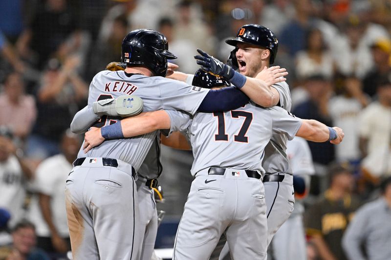 Sep 5, 2024; San Diego, California, USA; Detroit Tigers center fielder Parker Meadows (22) is congratulated after hitting a grand slam during the ninth inning against the San Diego Padres at Petco Park. Mandatory Credit: Denis Poroy-Imagn Images