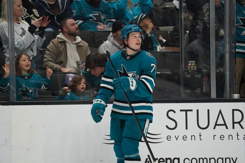 Jan 27, 2025; San Jose, California, USA;  San Jose Sharks center Macklin Celebrini (71) looks up at the scoreboard after scoring against the Pittsburgh Penguins in the third period at SAP Center at San Jose. Mandatory Credit: David Gonzales-Imagn Images
