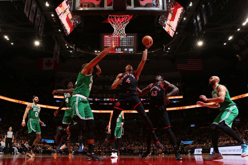 TORONTO, CANADA - JANUARY 15:  Scottie Barnes #4 of the Toronto Raptors drives to the basket during the game against the Boston Celtics on January 15, 2024 at the Scotiabank Arena in Toronto, Ontario, Canada.  NOTE TO USER: User expressly acknowledges and agrees that, by downloading and or using this Photograph, user is consenting to the terms and conditions of the Getty Images License Agreement.  Mandatory Copyright Notice: Copyright 2024 NBAE (Photo by Vaughn Ridley/NBAE via Getty Images)