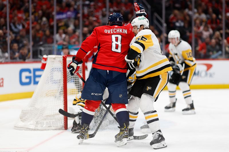 Apr 4, 2024; Washington, District of Columbia, USA; Washington Capitals left wing Alex Ovechkin (8) celebrates after scoring a goal on Pittsburgh Penguins goaltender Alex Nedeljkovic (39) in the third period at Capital One Arena. Mandatory Credit: Geoff Burke-USA TODAY Sports