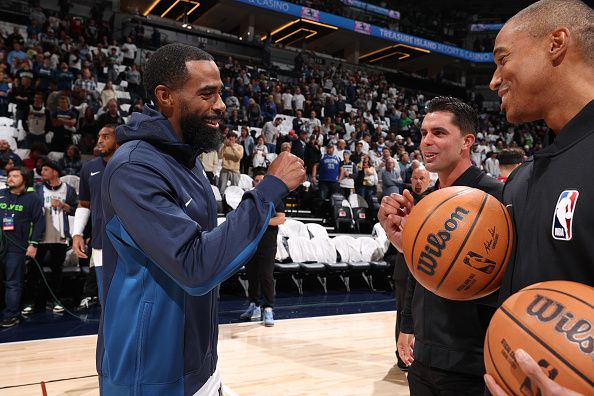 MINNEAPOLIS, MN -  OCTOBER 28: Mike Conley #10 of the Minnesota Timberwolves smiles before the game against the Miami Heat on October 28, 2023 at Target Center in Minneapolis, Minnesota. NOTE TO USER: User expressly acknowledges and agrees that, by downloading and or using this Photograph, user is consenting to the terms and conditions of the Getty Images License Agreement. Mandatory Copyright Notice: Copyright 2023 NBAE (Photo by David Sherman/NBAE via Getty Images)