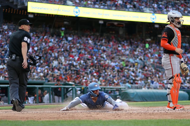 May 24, 2025; Washington, District of Columbia, USA; Washington Nationals second baseman Luis Garcia Jr. (2) scores during the seventh inning against the San Francisco Giants at Nationals Park. Mandatory Credit: Daniel Kucin Jr.-Imagn Images