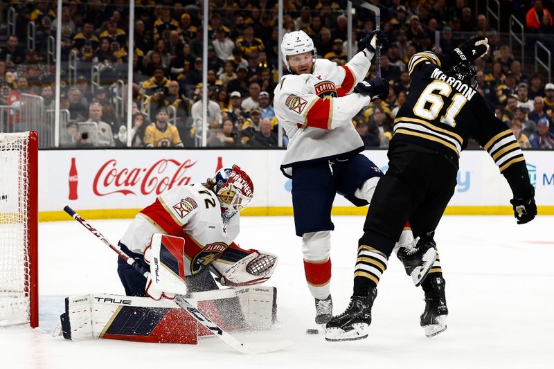 May 10, 2024; Boston, Massachusetts, USA; Boston Bruins left wing Pat Maroon (61) battles with Florida Panthers defenseman Dmitry Kulikov (7) in front as goaltender Sergei Bobrovsky (72) looks for a loose puck during the first period of game three of the second round of the 2024 Stanley Cup Playoffs at TD Garden. Mandatory Credit: Winslow Townson-USA TODAY Sports