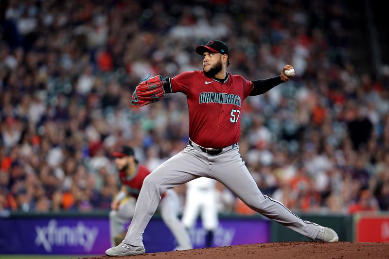 Sep 7, 2024; Houston, Texas, USA; Arizona Diamondbacks pitcher Eduardo Rodriguez (57) delivers a pitch against the Houston Astros during the first inning at Minute Maid Park. Mandatory Credit: Erik Williams-Imagn Images