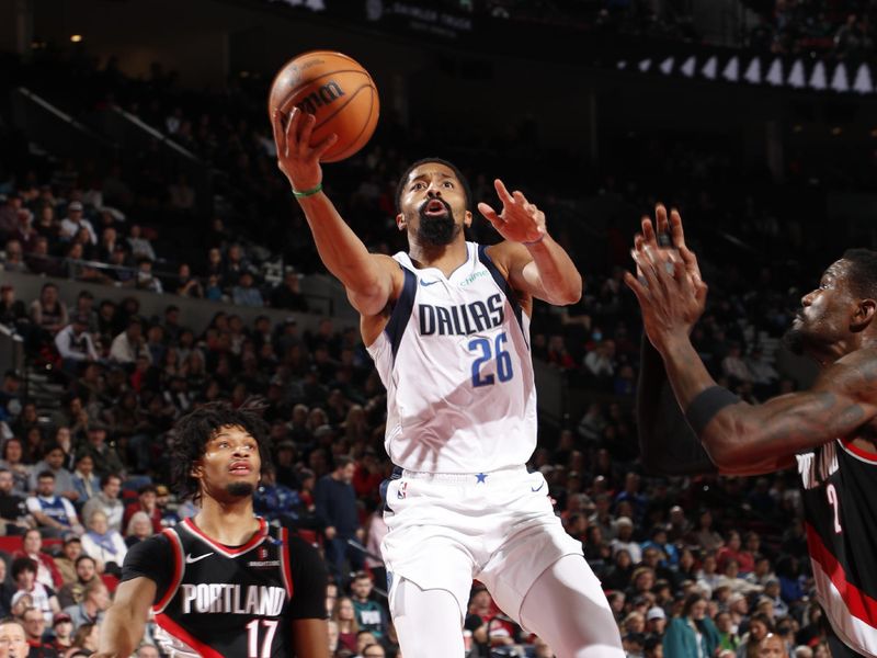 PORTLAND, OR - DECEMBER 1: Spencer Dinwiddie #26 of the Dallas Mavericks drives to the basket during the game against the Portland Trail Blazers on December 1, 2024 at the Moda Center Arena in Portland, Oregon. NOTE TO USER: User expressly acknowledges and agrees that, by downloading and or using this photograph, user is consenting to the terms and conditions of the Getty Images License Agreement. Mandatory Copyright Notice: Copyright 2024 NBAE (Photo by Cameron Browne/NBAE via Getty Images)