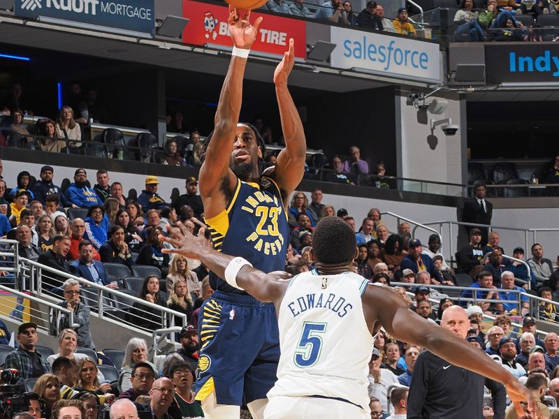 INDIANAPOLIS, IN - MARCH 7: Aaron Nesmith #23 of the Indiana Pacers shoots a three point basket during the game against the Minnesota Timberwolves on March 7, 2024 at Gainbridge Fieldhouse in Indianapolis, Indiana. NOTE TO USER: User expressly acknowledges and agrees that, by downloading and or using this Photograph, user is consenting to the terms and conditions of the Getty Images License Agreement. Mandatory Copyright Notice: Copyright 2024 NBAE (Photo by Ron Hoskins/NBAE via Getty Images)