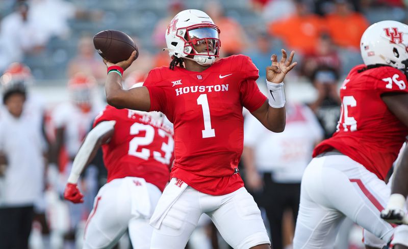 Sep 23, 2023; Houston, Texas, USA; Houston Cougars quarterback Donovan Smith (1) attempts a pass during the first quarter against the Sam Houston State Bearkats at TDECU Stadium. Mandatory Credit: Troy Taormina-USA TODAY Sports