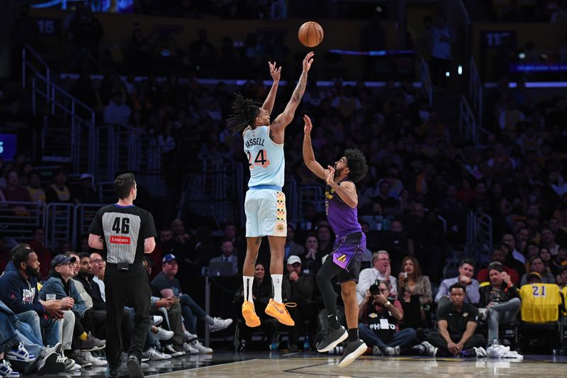 LOS ANGELES, CA - JANUARY 13: Devin Vassell #24 of the San Antonio Spurs shoots the ball during the game against the Los Angeles Lakers on January 13, 2025 at Crypto.Com Arena in Los Angeles, California. NOTE TO USER: User expressly acknowledges and agrees that, by downloading and/or using this Photograph, user is consenting to the terms and conditions of the Getty Images License Agreement. Mandatory Copyright Notice: Copyright 2025 NBAE (Photo by Noah Graham/NBAE via Getty Images)