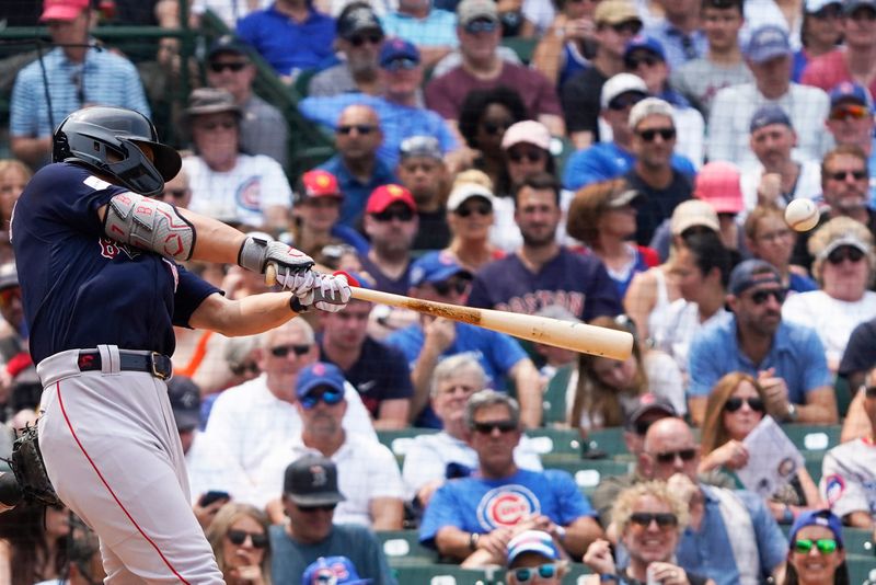 Jul 16, 2023; Chicago, Illinois, USA; Boston Red Sox left fielder Masataka Yoshida (7) hits a grand slam home run against the Chicago Cubs during the fifth inning at Wrigley Field. Mandatory Credit: David Banks-USA TODAY Sports