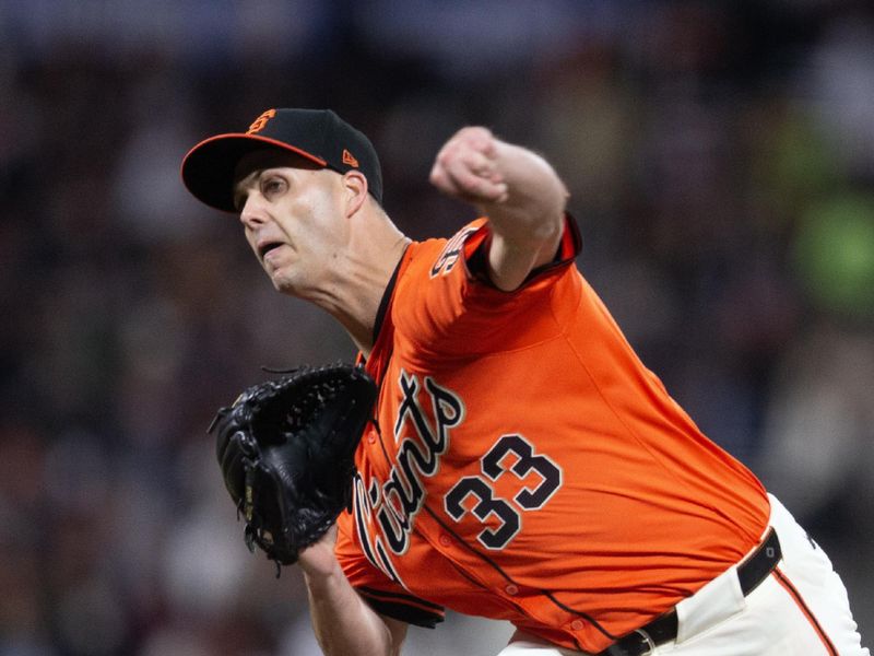 Jun 14, 2024; San Francisco, California, USA; San Francisco Giants pitcher Taylor Rogers (33) delivers a pitch against the Los Angeles Angels during the seventh inning at Oracle Park. Mandatory Credit: D. Ross Cameron-USA TODAY Sports