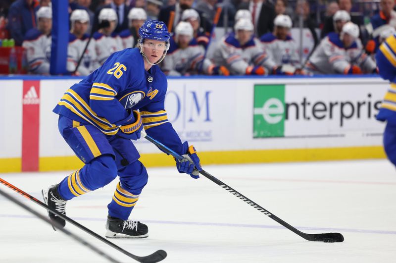 Mar 9, 2024; Buffalo, New York, USA;  Buffalo Sabres defenseman Rasmus Dahlin (26) looks to make a pass during the third period against the Edmonton Oilers at KeyBank Center. Mandatory Credit: Timothy T. Ludwig-USA TODAY Sports