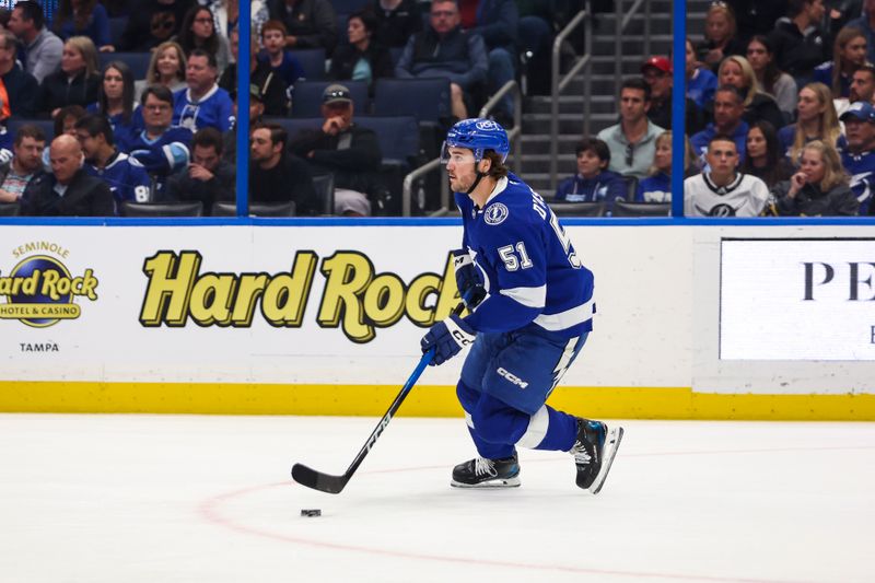 Feb 25, 2026; Tampa, Florida, USA; Tampa Bay Lightning defenseman Charle-Edouard D'Astous (51) handles the puck against the Toronto Maple Leafs during the second period at Benchmark International Arena. Mandatory Credit: Morgan Tencza-Imagn Images