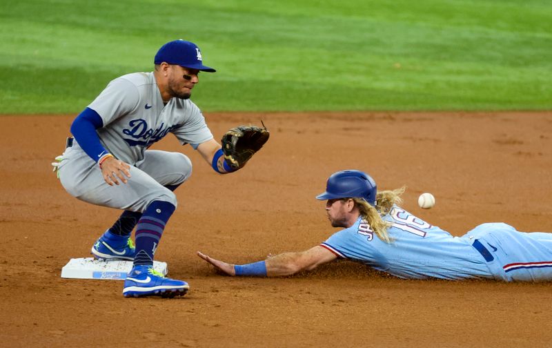 Jul 23, 2023; Arlington, Texas, USA;  Texas Rangers right fielder Travis Jankowski (16) steals second base ahead of the tag by Los Angeles Dodgers shortstop Miguel Rojas (11) during the first inning at Globe Life Field. Mandatory Credit: Kevin Jairaj-USA TODAY Sports