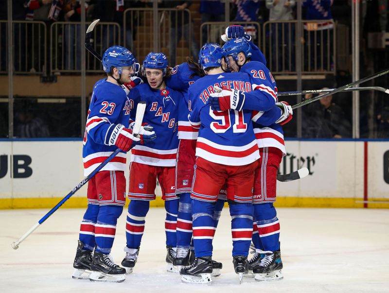 Apr 5, 2023; New York, New York, USA; New York Rangers left wing Chris Kreider (20) celebrates his goal with teammates during the first period against the Tampa Bay Lightning at Madison Square Garden. Mandatory Credit: Danny Wild-USA TODAY Sports