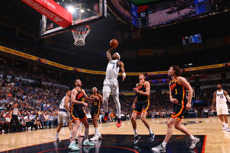 OKLAHOMA CITY, OK - APRIL 14:  Jaden Hardy #1 of the Dallas Mavericks shoots the ball during the game against the Oklahoma City Thunder on April 14, 2024 at Paycom Arena in Oklahoma City, Oklahoma. NOTE TO USER: User expressly acknowledges and agrees that, by downloading and or using this photograph, User is consenting to the terms and conditions of the Getty Images License Agreement. Mandatory Copyright Notice: Copyright 2024 NBAE (Photo by Zach Beeker/NBAE via Getty Images)