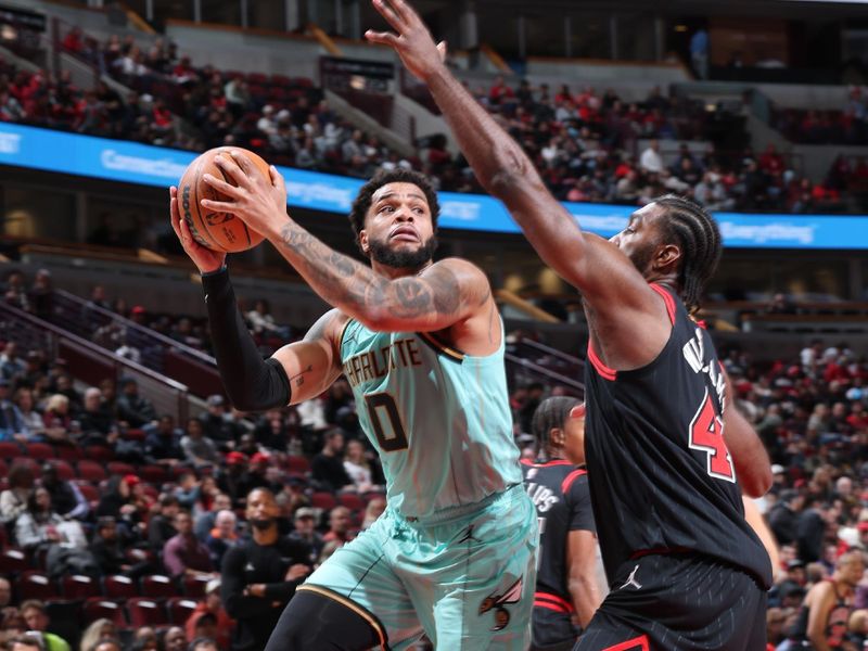 CHICAGO, IL - DECEMBER 13: Miles Bridges #0 of the Charlotte Hornets shoots the ball during the game against the Chicago Bulls on December 13, 2024 at United Center in Chicago, Illinois. NOTE TO USER: User expressly acknowledges and agrees that, by downloading and or using this photograph, User is consenting to the terms and conditions of the Getty Images License Agreement. Mandatory Copyright Notice: Copyright 2024 NBAE (Photo by Jeff Haynes/NBAE via Getty Images)