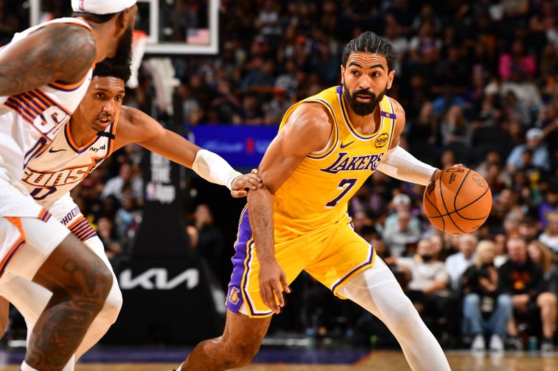 PHOENIX, AZ - OCTOBER 17: Gabe Vincent #7 of the Los Angeles Lakers handles the ball during the game against the Phoenix Suns during a NBA Preseason game on October 17, 2024 at Footprint Center in Phoenix, Arizona. NOTE TO USER: User expressly acknowledges and agrees that, by downloading and or using this photograph, user is consenting to the terms and conditions of the Getty Images License Agreement. Mandatory Copyright Notice: Copyright 2024 NBAE (Photo by Barry Gossage/NBAE via Getty Images)