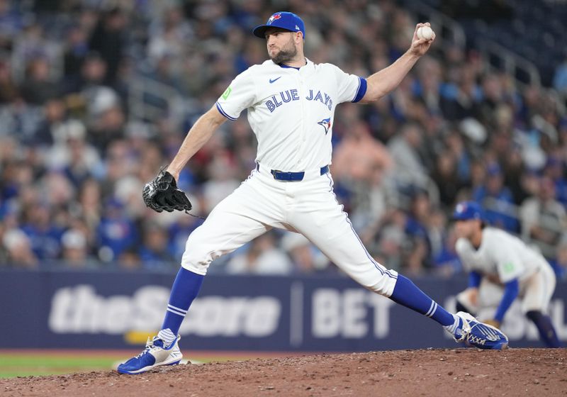 Apr 17, 2024; Toronto, Ontario, CAN; Toronto Blue Jays relief pitcher Tim Mayza (58) throws a pitch against the New York Yankees during the ninth inning at Rogers Centre. Mandatory Credit: Nick Turchiaro-USA TODAY Sports