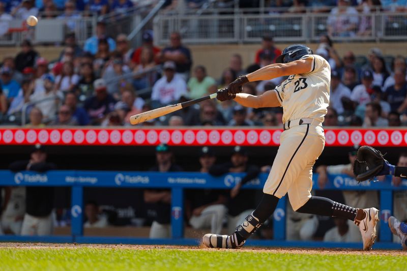 Sep 1, 2024; Minneapolis, Minnesota, USA; Minnesota Twins third baseman Royce Lewis (23) hits a three-run home run against the Toronto Blue Jays in the eighth inning at Target Field. Mandatory Credit: Bruce Kluckhohn-USA TODAY Sports