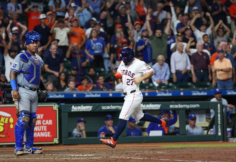 Aug 29, 2024; Houston, Texas, USA;  Houston Astros second baseman Jose Altuve (27) scores against the Kansas City Royals iin the eighth inning at Minute Maid Park. Mandatory Credit: Thomas Shea-USA TODAY Sports