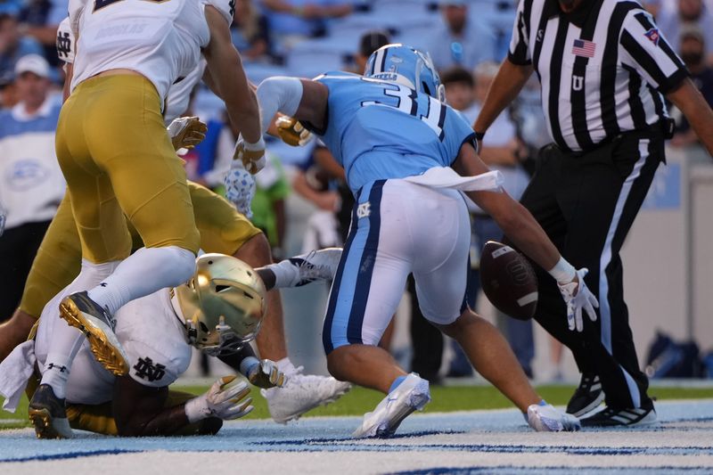 Notre Dame Fighting Irish Triumph at Kenan Stadium Against North Carolina Tar Heels in Football...